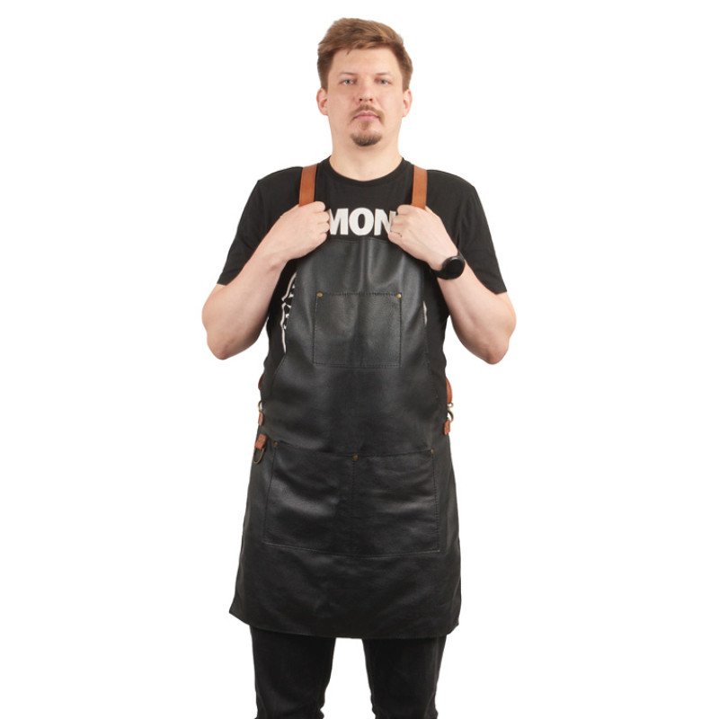 Фартук из натуральной кожи флотер  Материал: натуральная кожа КРС, цвет фартука: черный, цвет ремней: светлый бук, фурнитура из металлического сплава ЦАМ, цвет фурнитуры: антик, размер универсальный