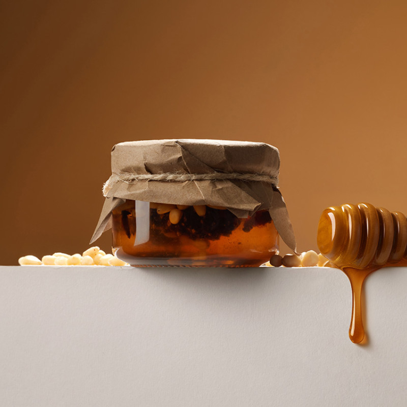 Мед с сосновой шишкой и кедровым орехом 120 гр.